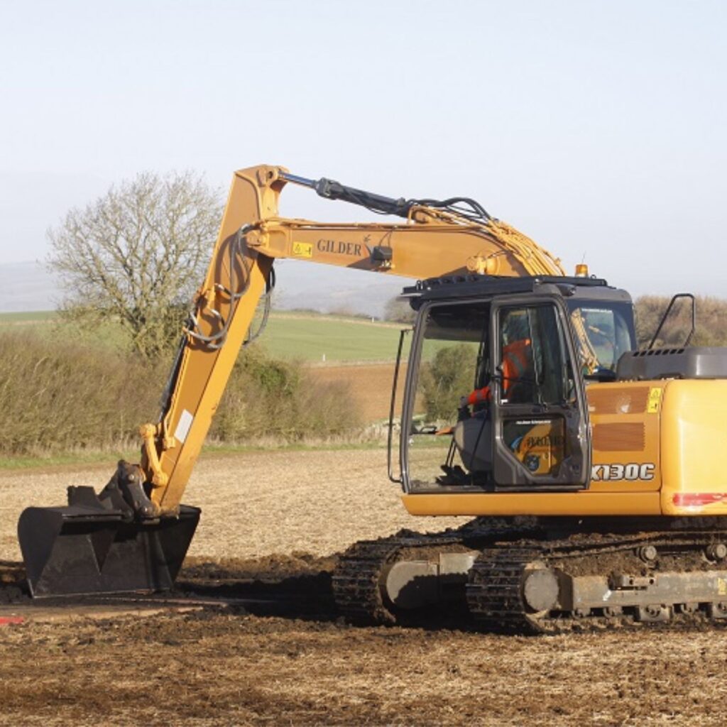 A digger in a field