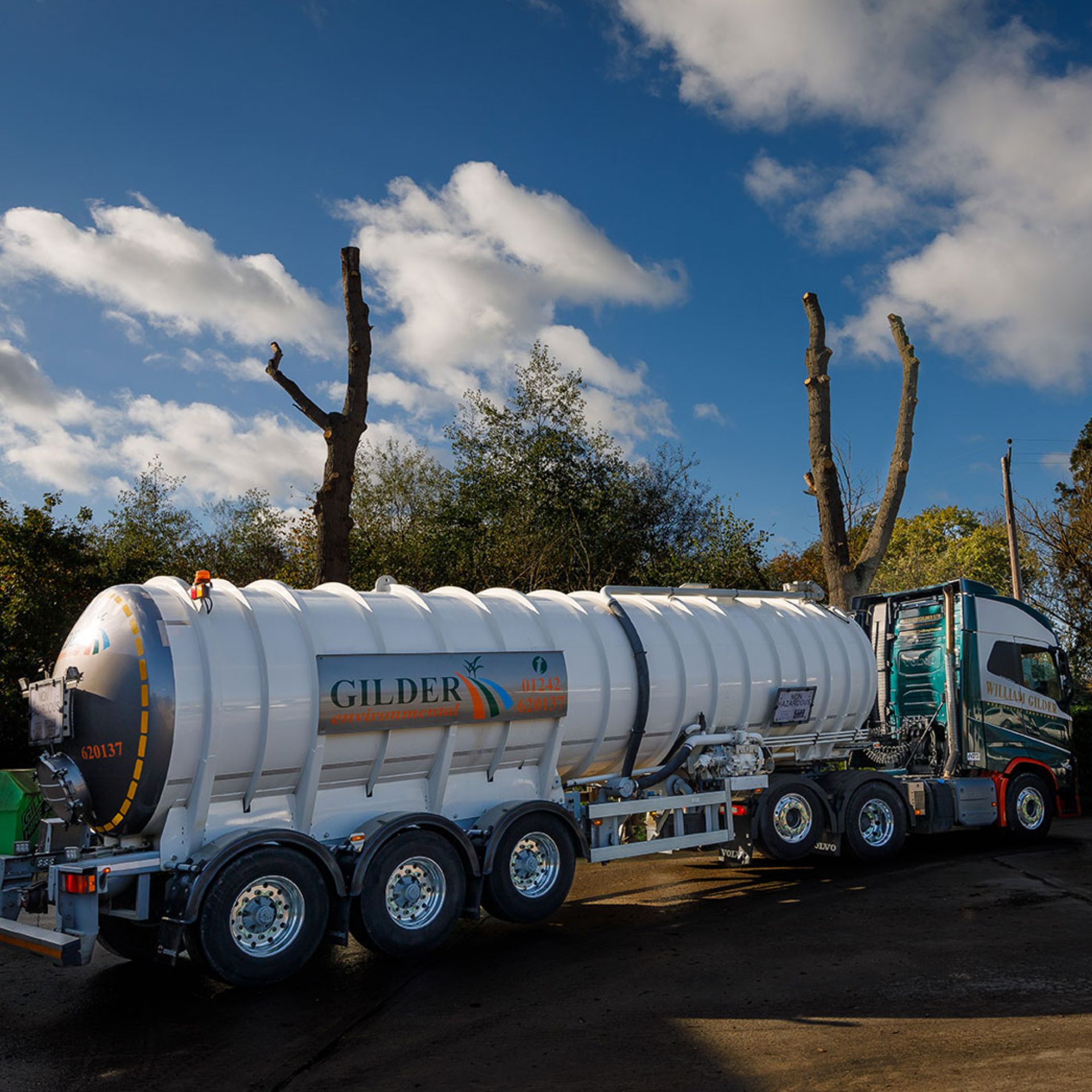 Wide view of a William Gilder Group tanker lorry on a sunny day