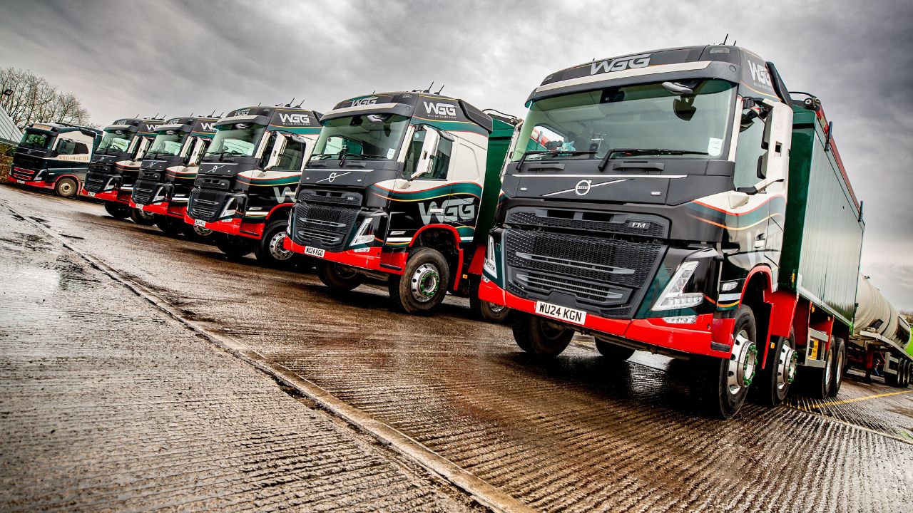 A line of lorries in a service yard