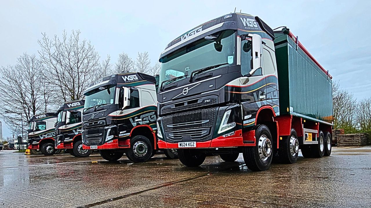 A line of lorries on a rainy day