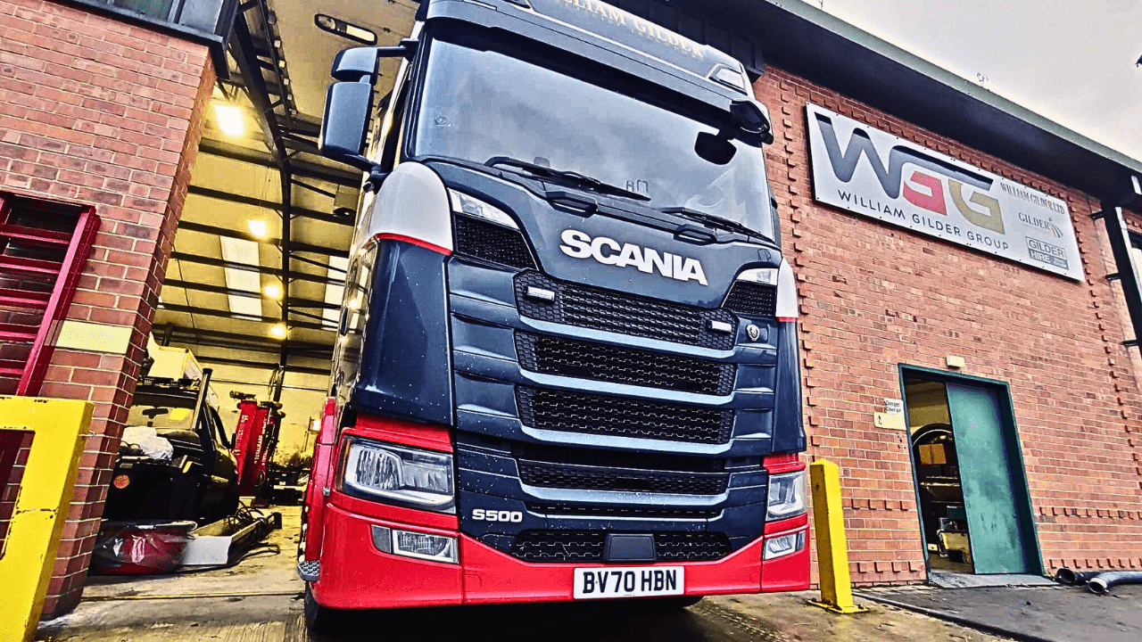 A lorry at a workshop